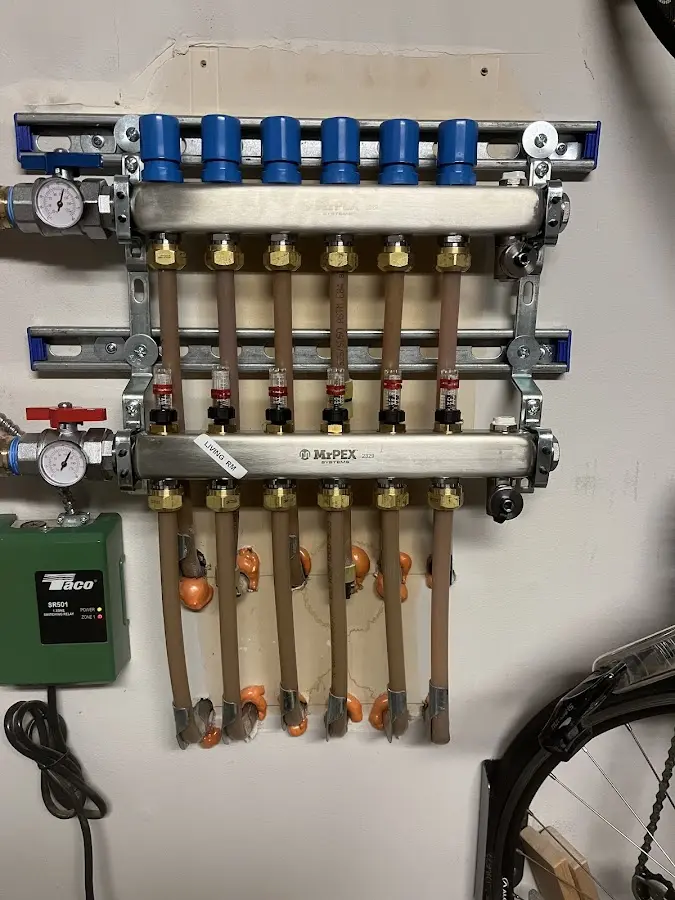 Plumber performing Gas Line Installation at a residential property in Northbrook